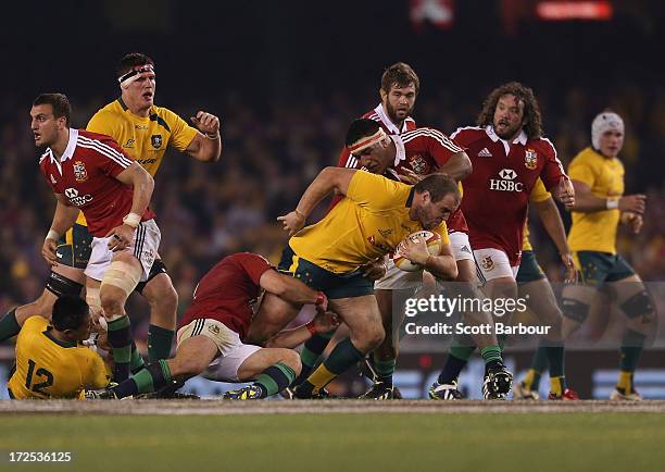 Ben Alexander of the Wallabies is tackled during game two of the International Test Series between the Australian Wallabies and the British & Irish...