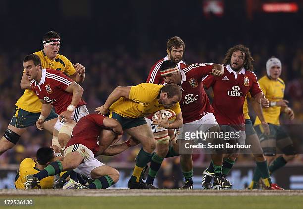 Ben Alexander of the Wallabies is tackled during game two of the International Test Series between the Australian Wallabies and the British & Irish...