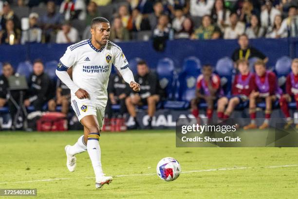 Douglas Costa of Los Angeles Galaxy controls the ball during the game against Real Salt Lake at Dignity Health Sports Park on October 14, 2023 in Los...