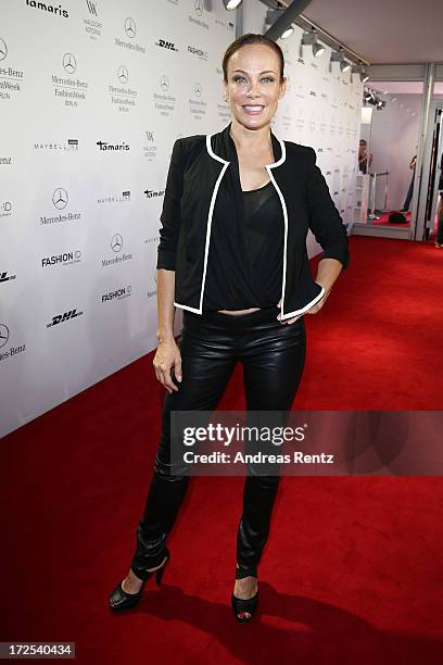 Sonja Kirchberger attends the Minx By Eva Lutz Show during the Mercedes-Benz Fashion Week Spring/Summer 2014 at the Brandenburg Gate on July 3, 2013...