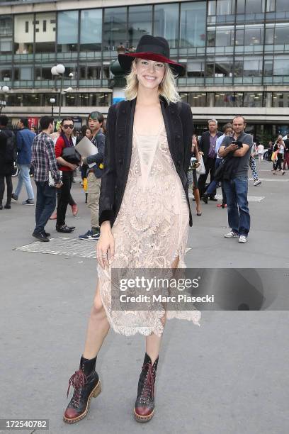 Elena Perminova attends the Elie Saab show as part of Paris Fashion Week Haute-Couture Fall/Winter 2013-2014 at Palais Brongniart on July 3, 2013 in...