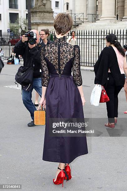 Ulyana Sergeenko attends the Elie Saab show as part of Paris Fashion Week Haute-Couture Fall/Winter 2013-2014 at Palais Brongniart on July 3, 2013 in...