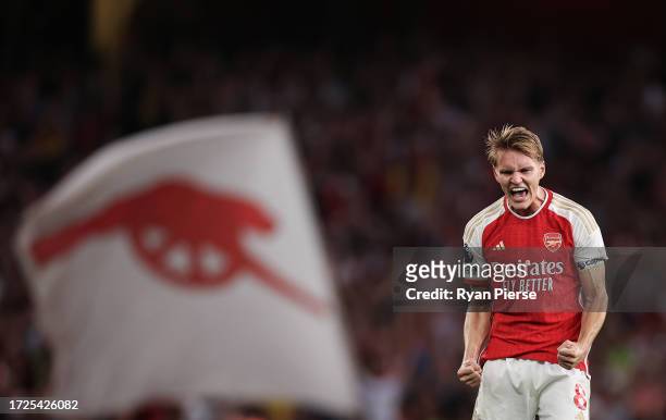 Martin Odegaard of Arsenal celebrates victory on the final whistle during the Premier League match between Arsenal FC and Manchester City at Emirates...