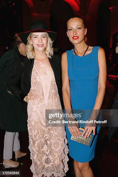 Elena Perminova and Petra Nemcova attend the Elie Saab show as part of Paris Fashion Week Haute-Couture Fall/Winter 2013-2014 at Palais Brongniart on...