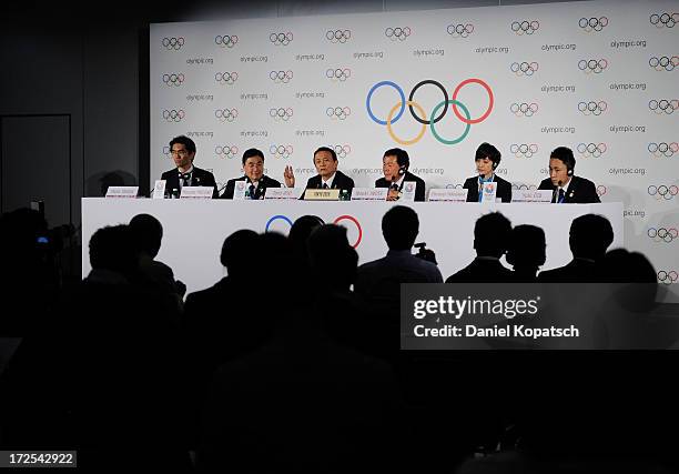 Taro Aso , Finance and Deputy Prime Minister speaks next to Masato Mizuno , CEO of Tokyo 2020 and Naoki Inose , Governor of Tokyo at a press...