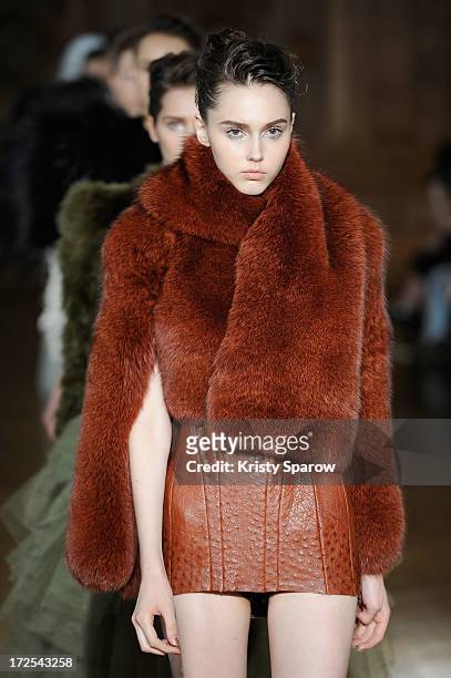 Models walk the runway during the Serkan Cura Couture show as part of Paris Fashion Week Haute-Couture Fall/Winter 2013-2014 at Mairie du 4e on July...
