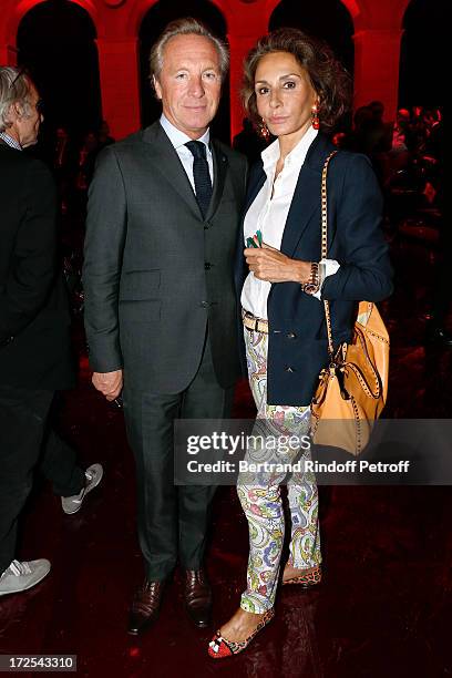 Fashion designer Edouard Vermeulen and former model Nati Abascal attend the Elie Saab show as part of Paris Fashion Week Haute-Couture Fall/Winter...