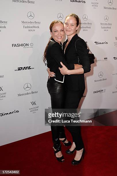 Sonja Kirchberger and Jeanette Hain attend the Minx By Eva Lutz Show during the Mercedes-Benz Fashion Week Spring/Summer 2014 at the Brandenburg Gate...