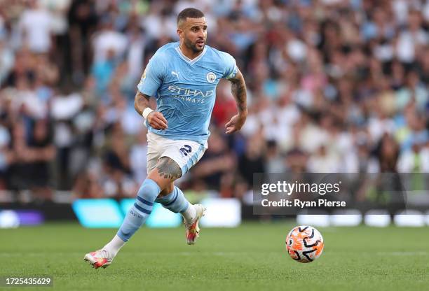 Kyle Walker of Manchester City controls the ball during the Premier League match between Arsenal FC and Manchester City at Emirates Stadium on...