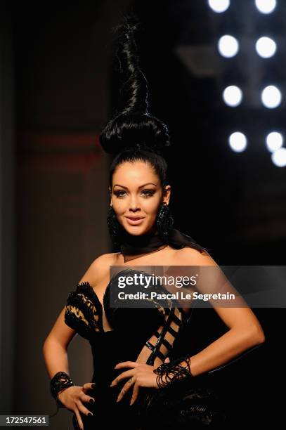 Nabilla Benattia walks the runway during the Jean Paul Gaultier show as part of Paris Fashion Week Haute-Couture Fall/Winter 2013-2014 at 325 Rue...