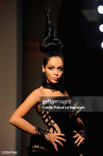 Nabilla Benattia walks the runway during the Jean Paul Gaultier show as part of Paris Fashion Week Haute-Couture Fall/Winter 2013-2014 at 325 Rue...