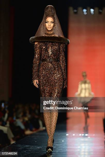 Model walks the runway during the Jean Paul Gaultier show as part of Paris Fashion Week Haute-Couture Fall/Winter 2013-2014 at 325 Rue Saint Martin...