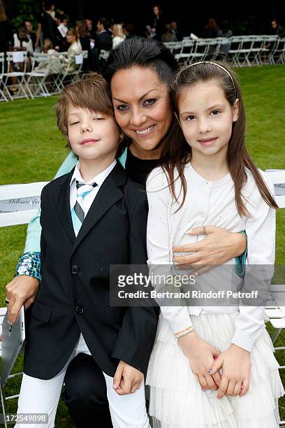 Hermine de Clermont-Tonnerre and her children Allegra and Calixte attend the Frank Sorbier show as part of Paris Fashion Week Haute-Couture...
