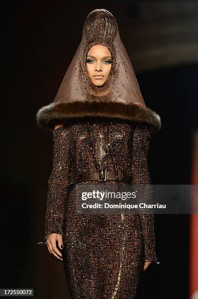 Model walks the runway during the Jean Paul Gaultier show as part of Paris Fashion Week Haute-Couture Fall/Winter 2013-2014 at 325 Rue Saint Martin...