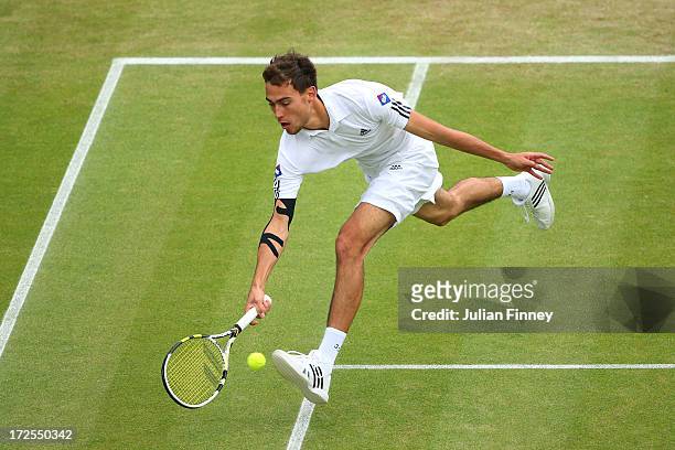 Jerzy Janowicz of Poland plays a forehand during the Gentlemen's Singles quarter-final match against Lukasz Kubot of Poland on day nine of the...