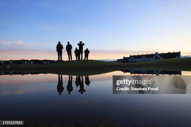 General view as Grounds Staff look across the 17th hole as water sits on course ahead of Round Three on Day Five of the Alfred Dunhill Links...