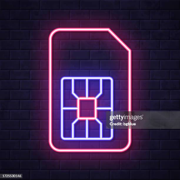 stockillustraties, clipart, cartoons en iconen met sim card. glowing neon icon on brick wall background - sim card