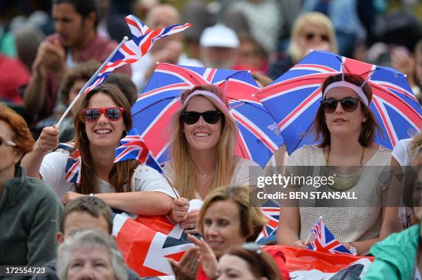 Tennis fans watch Britain's Andy Murray play against Spain's Fernando Verdasco on the big screen at Murray Mount during their men's singles...