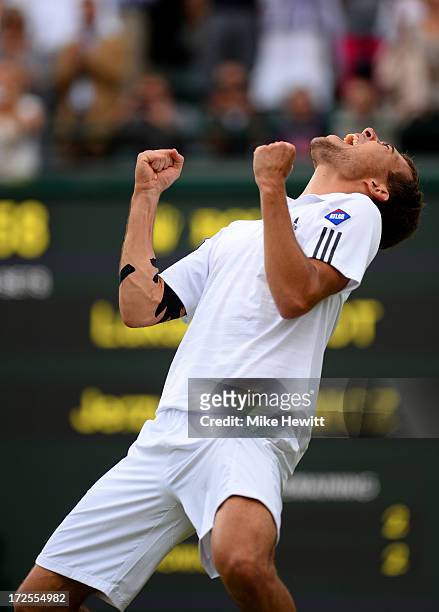 Jerzy Janowicz of Poland celebrates match point during the Gentlemen's Singles quarter-final match against Lukasz Kubot of Poland on day nine of the...