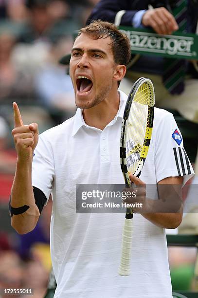 Jerzy Janowicz of Poland celebrates a point during the Gentlemen's Singles quarter-final match against Lukasz Kubot of Poland on day nine of the...