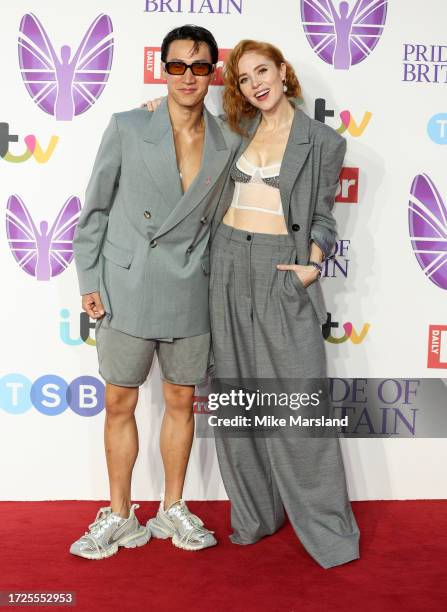 Carlos Gu and Angela Scanlon arrive at the Pride Of Britain Awards 2023 at Grosvenor House on October 08, 2023 in London, England.