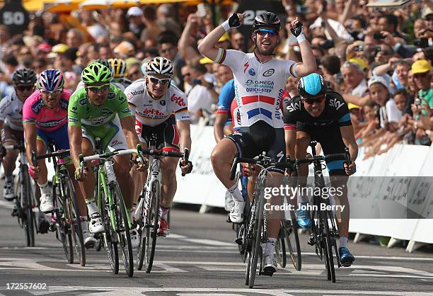 Mark Cavendish of Great Britain and Team Omega Pharma Quick-Step wins ahead of Edvald Boasson Hagen of Norway and Team Sky Pro Cycling, Peter Sagan...