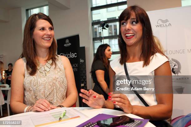 Melissa Otiz Gomez reacts at the Blackberry Style Lounge during Mercedes-Benz Fashion Week in Berlin on July 3, 2013 in Berlin, Germany.