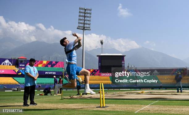 Reece Topley of England bowls during a nets session at Himachal Pradesh Cricket Association Stadium on October 09, 2023 in Dharamsala, India.