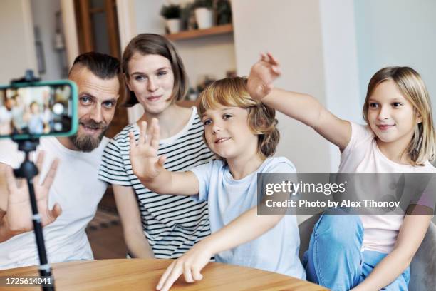 Family Using Filming Camera 2,507 Family Video Recording Stock Photos, High-Res Pictures, and ...