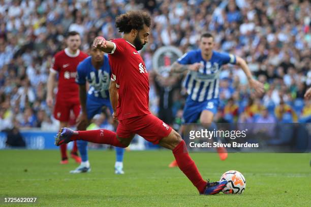 Mohamed Salah of Liverpool scores the team's second goal from a penalty during the Premier League match between Brighton & Hove Albion and Liverpool...