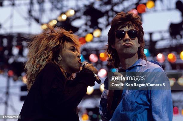 Mick Jagger of the Rolling Stones and Tina Turner are photographed on stage during Live Aid on July 13, 1985 at John F. Kennedy Stadium in...