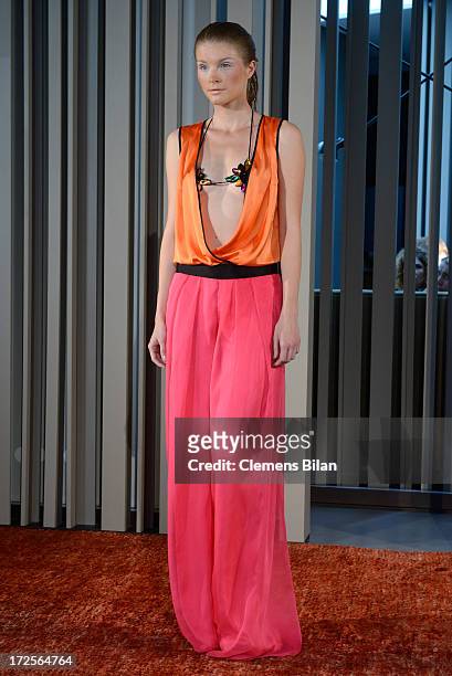 Model poses the runway at Simone Anes & Stephan Pelger Show during Mercedes-Benz Fashion Week Spring/Summer 2014 on July 3, 2013 in Berlin, Germany.