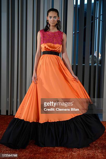Model poses the runway at Simone Anes & Stephan Pelger Show during Mercedes-Benz Fashion Week Spring/Summer 2014 on July 3, 2013 in Berlin, Germany.