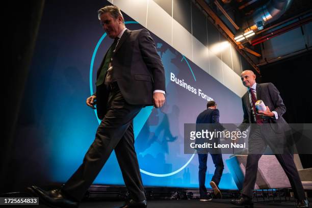 Leader of the Labour Party Keir Starmer leaves the stage following a Q&A session a the Business Forum during the annual Labour Party conference on...