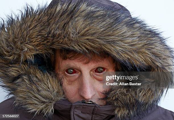 man with blood red eyes - devon stock pictures, royalty-free photos & images