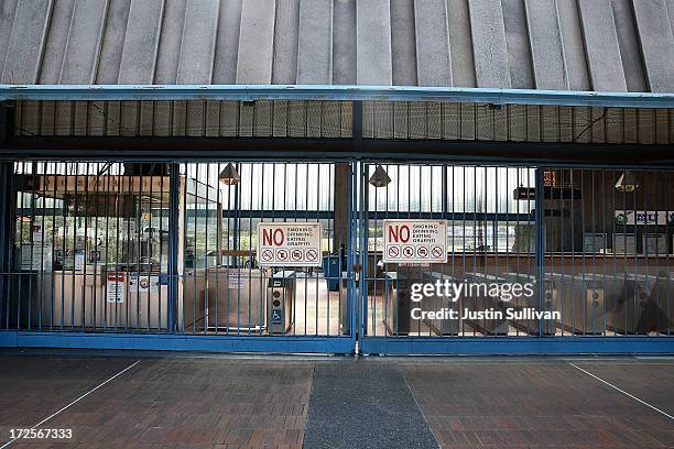 Closed pay gates are seen at the Bay Area Rapid Transit Glen Park station on July 3, 2013 in San Francisco, California. For a third day, hundreds of...