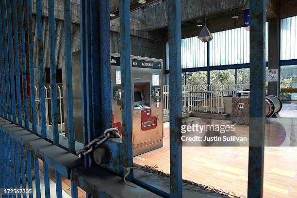 Closed pay gates are seen at the Bay Area Rapid Transit Glen Park station on July 3, 2013 in San Francisco, California. For a third day, hundreds of...