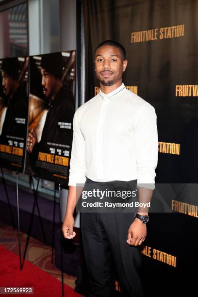 Actor Michael B. Jordan, poses for photos during the red carpet arrivals for the "Fruitvale Station" movie screening at the Showplace ICON Theatres...