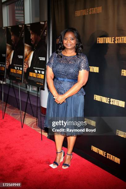 Actress and Oscar winner Octavia Spencer, poses for photos during the red carpet arrivals for the "Fruitvale Station" movie screening at the...