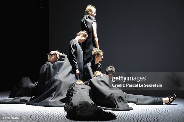 Models pose during the Viktor&Rolf show as part of Paris Fashion Week Haute-Couture Fall/Winter 2013-2014 at La Gaite Lyrique on July 3, 2013 in...