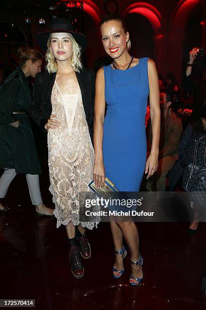 Elena Perminova and Petra Nemcova attend the Elie Saab show as part of Paris Fashion Week Haute-Couture Fall/Winter 2013-2014 at Palais Brongniart on...