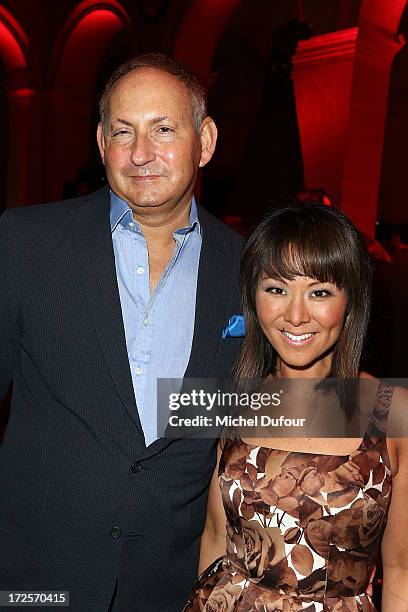 John Dempsey and his wife attend the Elie Saab show as part of Paris Fashion Week Haute-Couture Fall/Winter 2013-2014 at Palais Brongniart on July 3,...