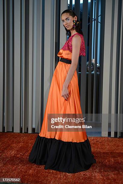 Model walks the runway at Simone Anes & Stephan Pelger Show during Mercedes-Benz Fashion Week Spring/Summer 2014 on July 3, 2013 in Berlin, Germany.