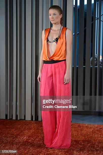Model walks the runway at Simone Anes & Stephan Pelger Show during Mercedes-Benz Fashion Week Spring/Summer 2014 on July 3, 2013 in Berlin, Germany.