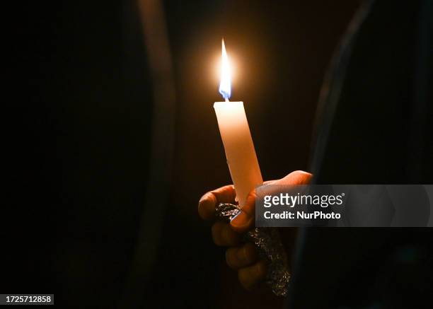 Members of the Jewish diaspora of Edmonton gather during a candlelight vigil and community-wide Havdalah ceremony to mark the one-week anniversary of...