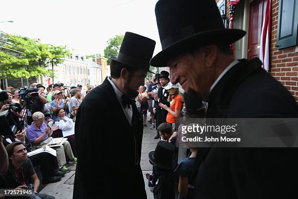 Constestants take part in an Abraham Lincoln look-alike contest on the 150th anniversary of the historic Battle of Gettysburg on July 3, 2013 in...