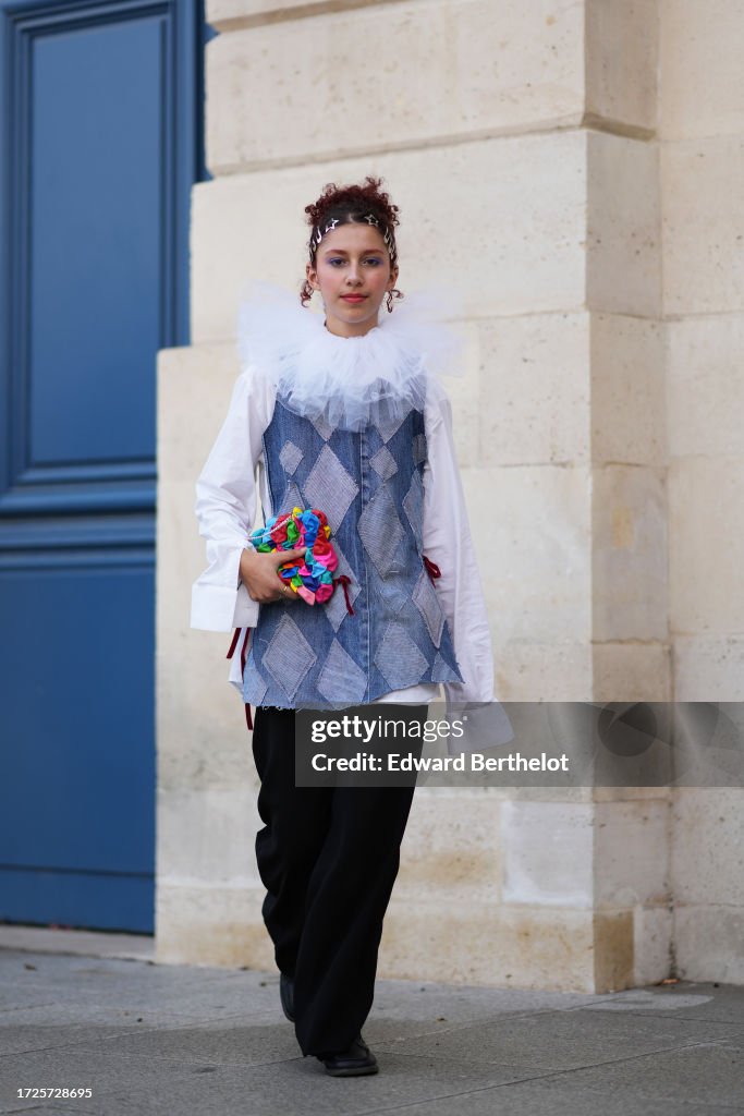Street Style - Paris Fashion Week - Womenswear Spring/Summer 2024 - Day Five