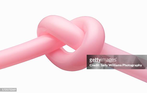 pink balloon tied in a knot - knots stock pictures, royalty-free photos & images