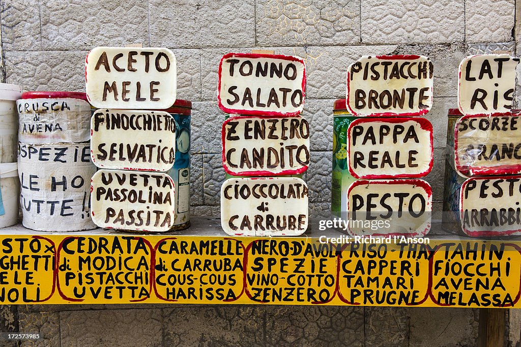 Signs at stall at produce market on Ortygia