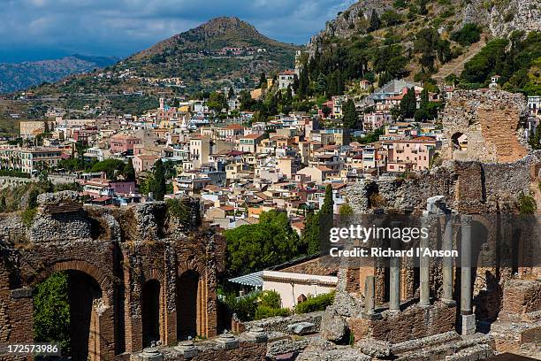 ruins of greek theatre (teatro greco) & town - teatro greco taormina bildbanksfoton och bilder